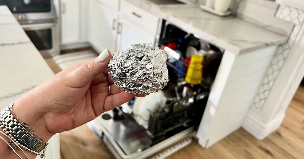 Why use aluminum foil in the dishwasher, and what are the results?